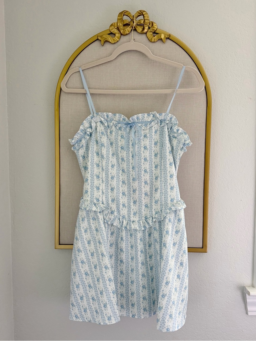 Main Strip Light Blue and White Floral Ruffle Romper